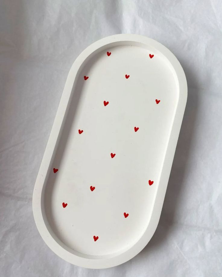 Ivory oblong tray decorated with small red hearts